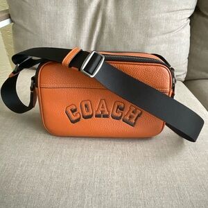 COACH Orange Pebbled Leather Belt Bag with Black Strap